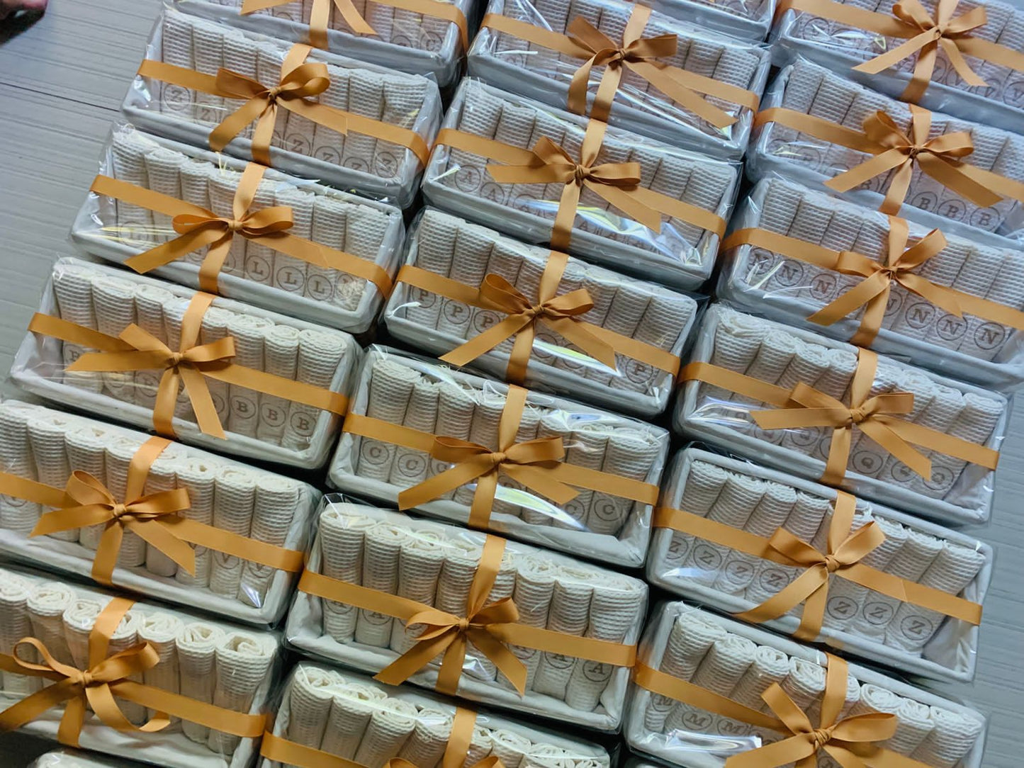 100% Cotton Waffle Weave Hand Towels in woven baskets